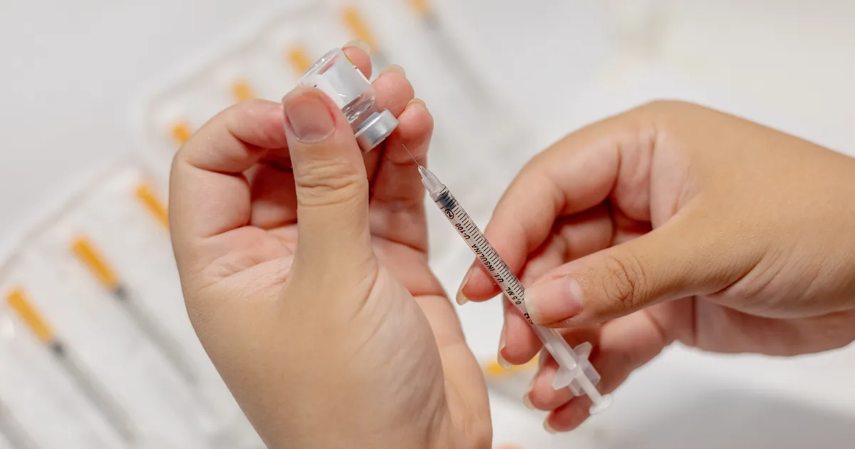 Provider reviewing a physician-supervised peptide protocol with a client at iCRYO New Braunfels