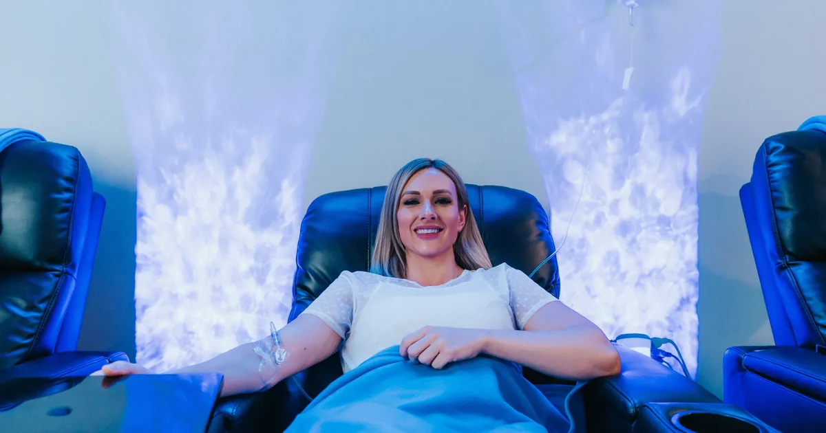 Client receiving IV hydration therapy for energy at iCRYO New Braunfels