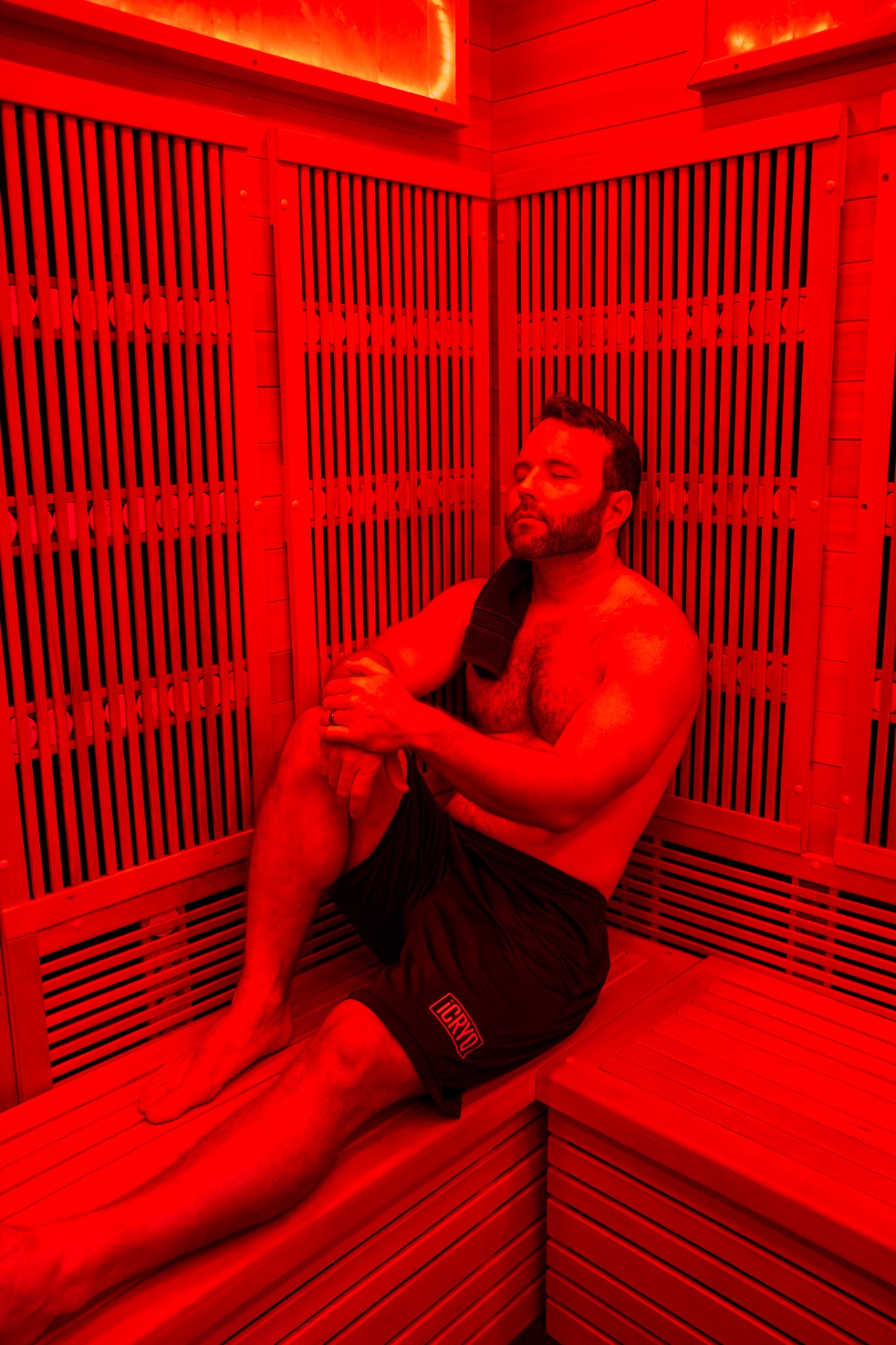 Client relaxing in the iCRYO New Braunfels infrared sauna